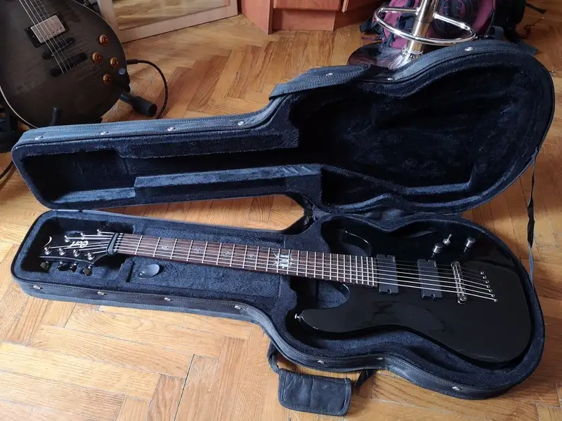 Cort EVL K57B BK + kemény tok Elektromos gitár 7 húros
