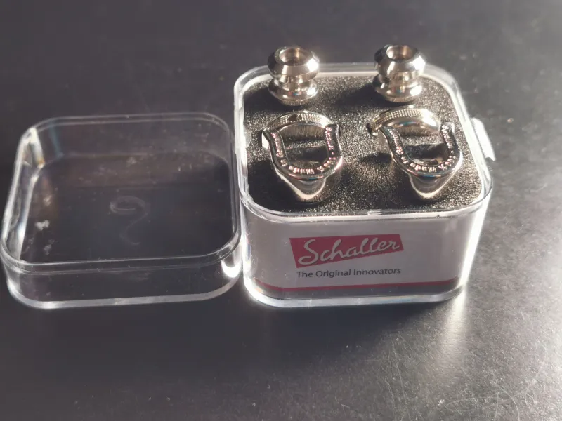Schaller S-Locks nikkel hevederzár Straplock