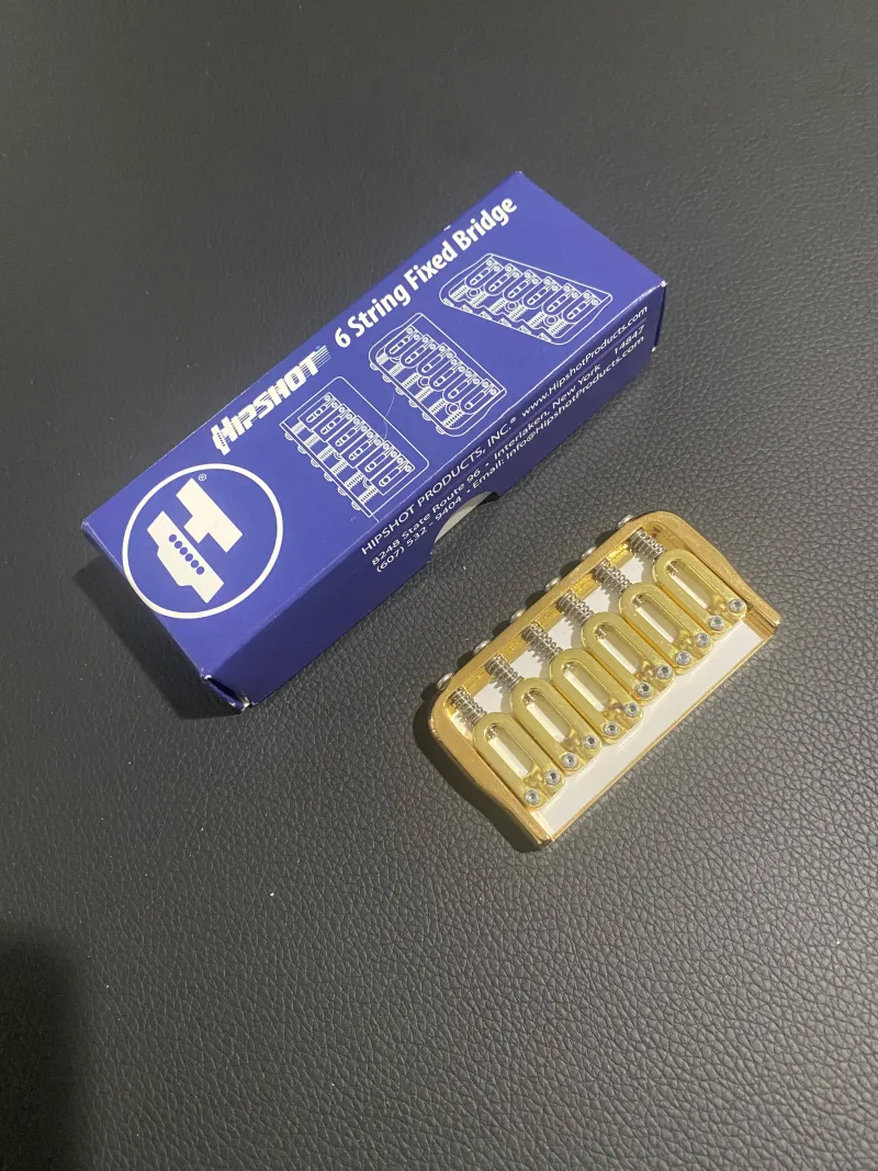 Hipshot 6 string fixed gold bridge Bridge