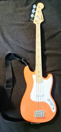 Squier Sonic Bronco Tahitian Coral Tokkal-vonóval